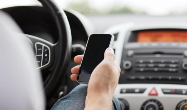 Как можно пользоваться телефоном за рулем и что будет, если нарушить правила?
